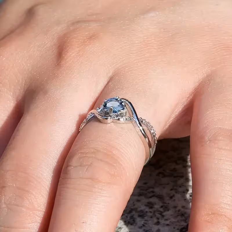 A Minimalist Wave-shaped Blue Synthetic Zirconia Ladies' Ring For Parties, Dances, Daily Wear, And Jewelry Gifts.